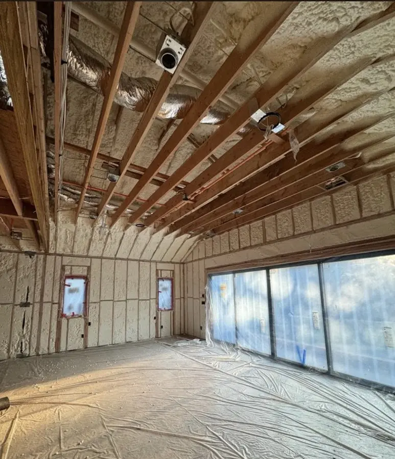 Interior walls and ceiling insulated with spray foam during new construction in Monticello